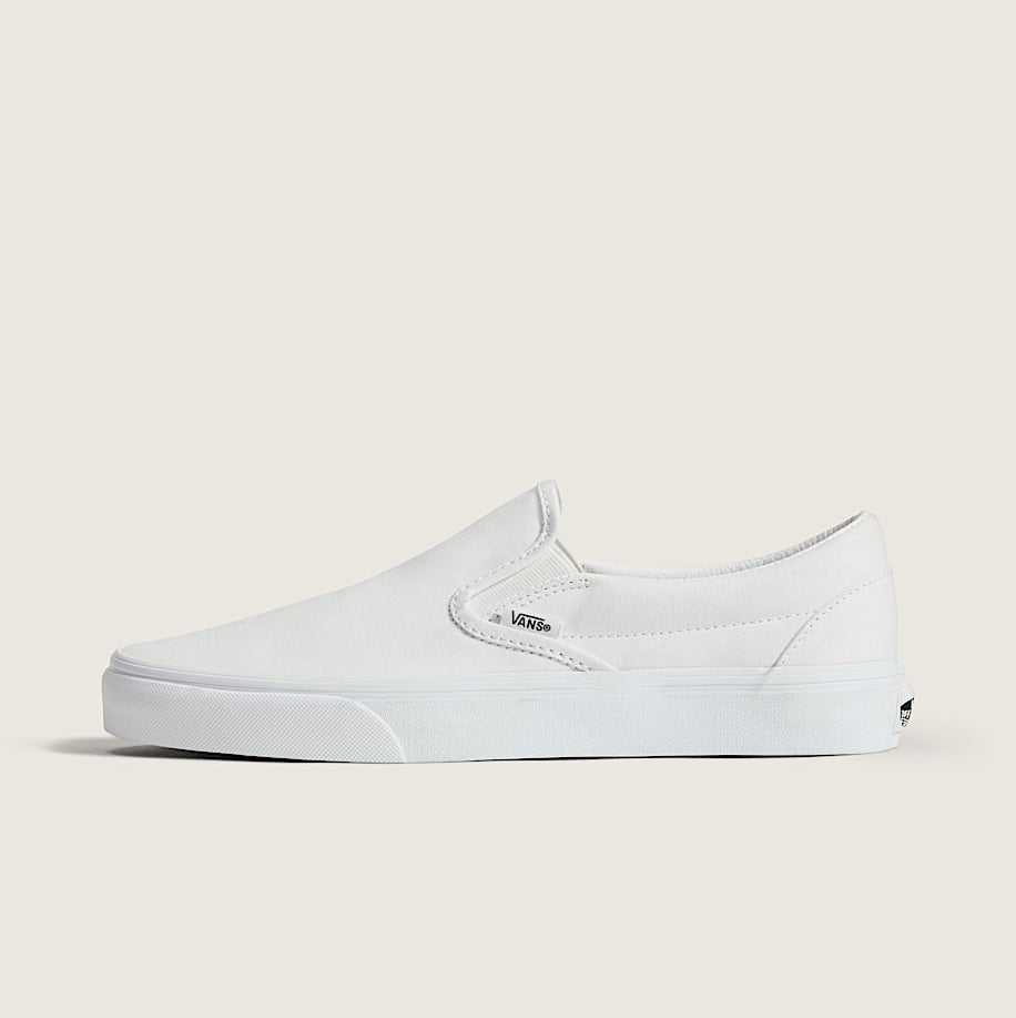 White slip-on sneaker on a light gray background