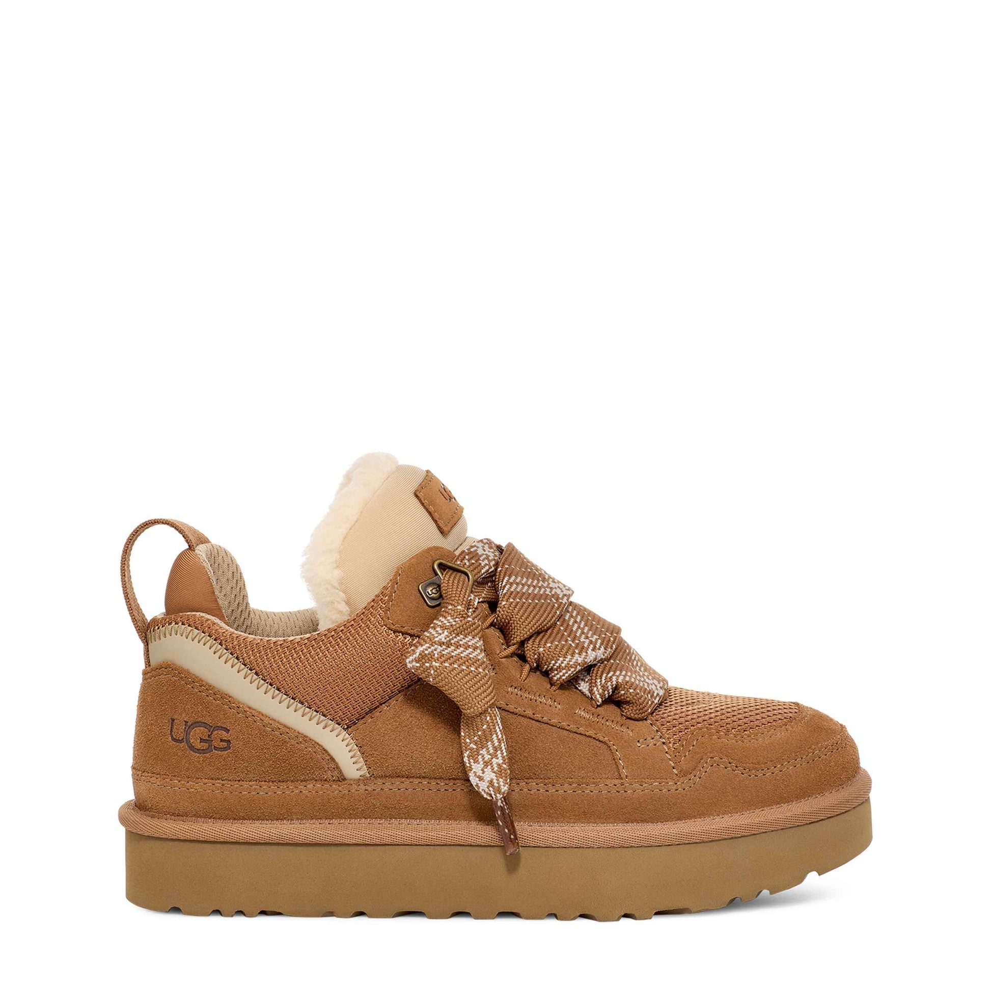 Brown UGG sneaker with fur lining on a white background
