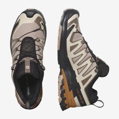 Pair of hiking shoes with camouflage pattern on a white background