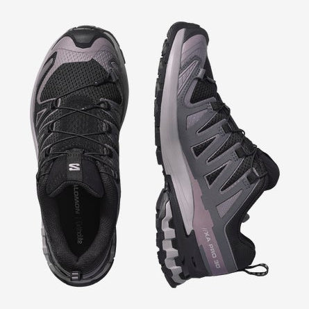 Black and gray hiking shoes with brand logo on a white background